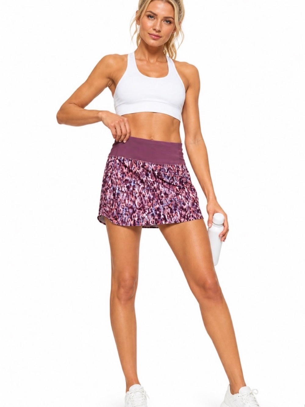 Athleta Run With It Skort features a vibrant multicolor patterned XS